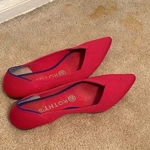 Rothys, size 7 1/2. Never worn. Color is more of a strawberry color than red